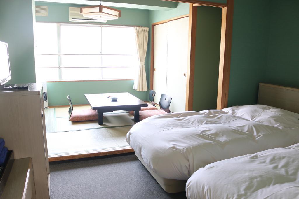 Hotel Sankeien Sapporo Pokoj fotografie